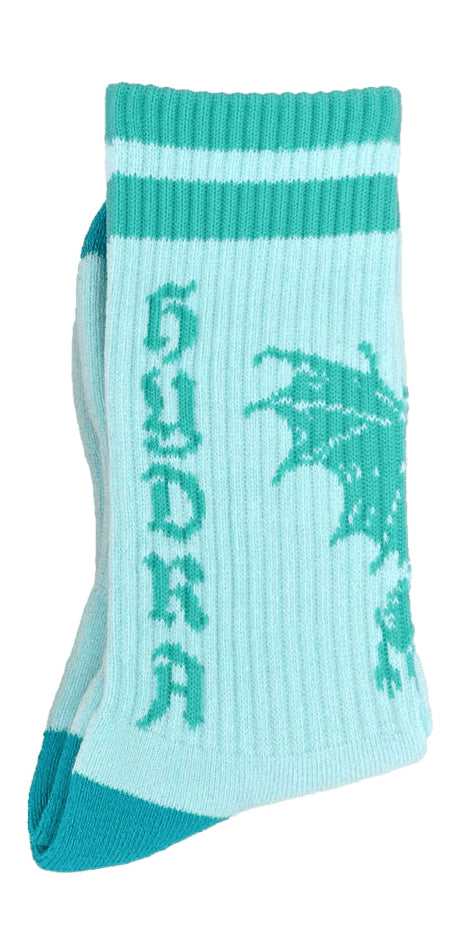 Two socks with dragon designs and text on a white background