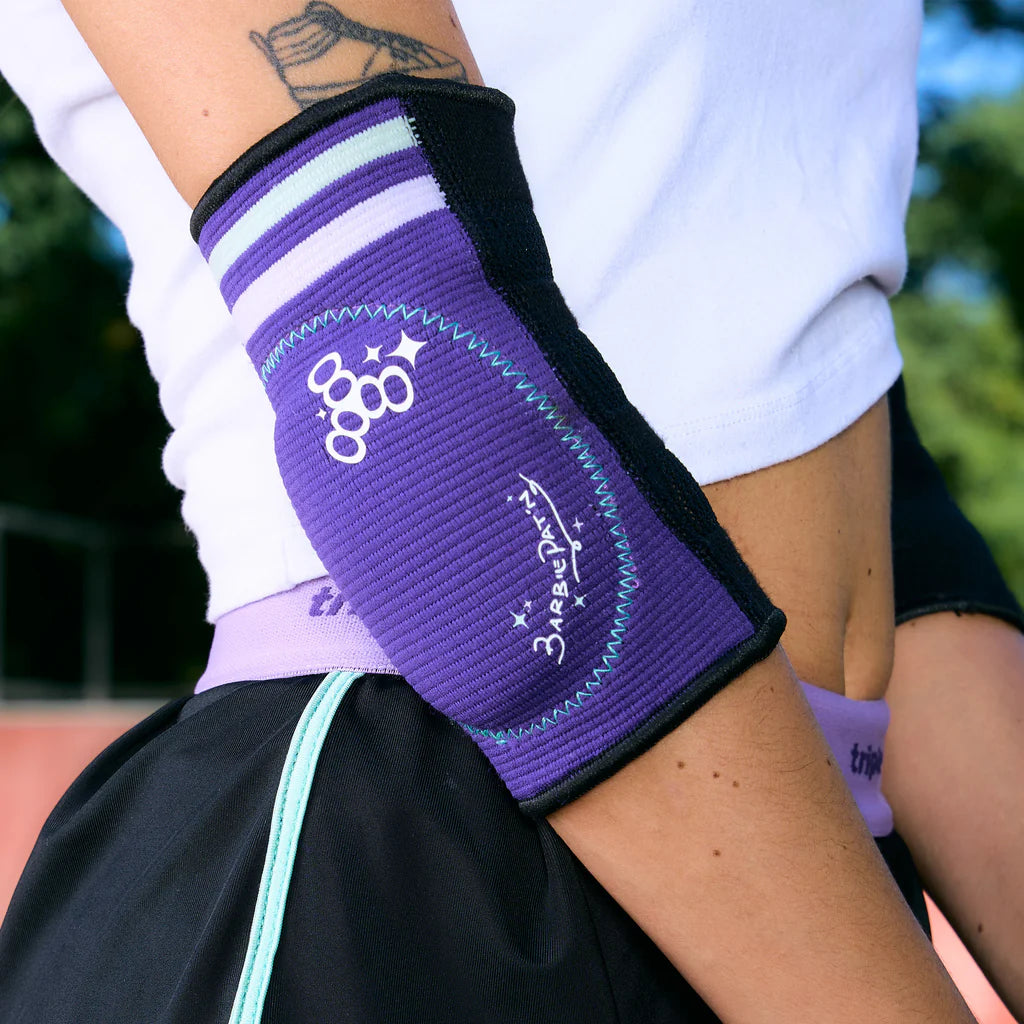 Purple soft pad on human elbow 