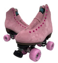 A pair of pink Sure-Grip roller skates with black details and pink wheels.
