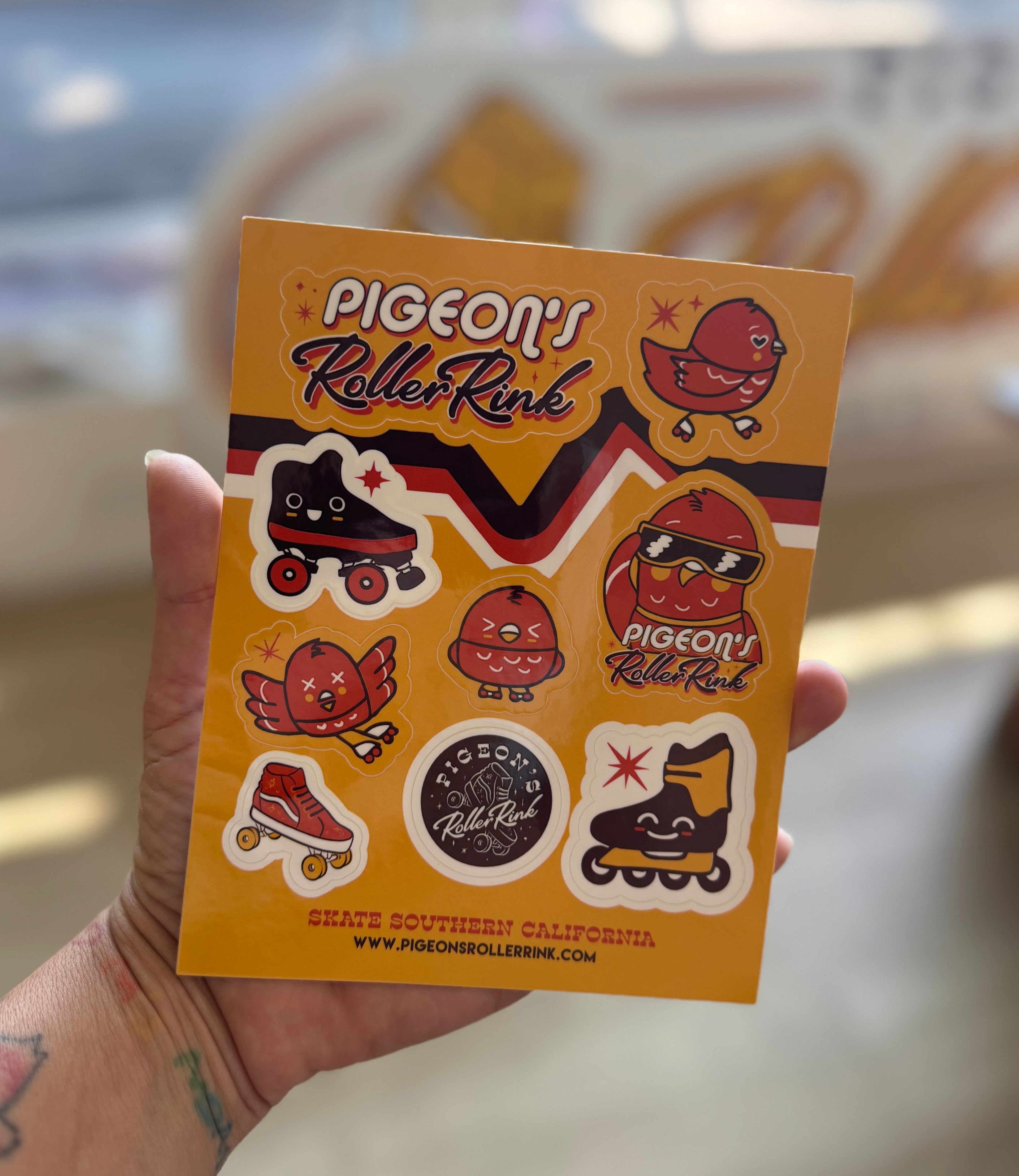 Hand holding sticker sheet