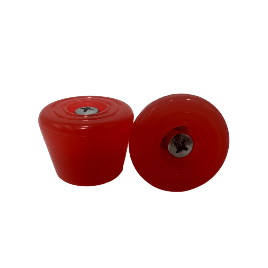 A pair of red Impala toe stops for roller skates, showing slight packaging damage.